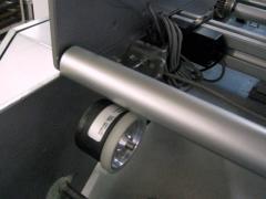 Encoder wheel controlling inkjet speed